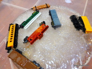 Rescuing Toy Trains from Ice:  a great activity to encourage problem solving and scientific exploration @ Play Trains!