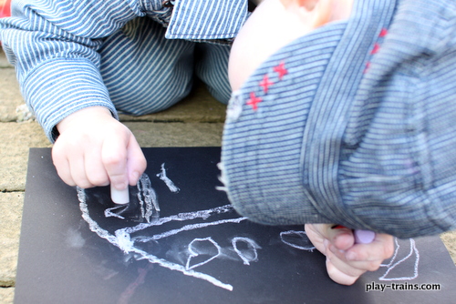 Exploring the Art of Steam Train, Dream Train (Part 1) @ Play Trains!  Drawing a steam engine with chalk to learn about the illustrations in the the author and the illustrator of Goodnight, Goodnight, Construction Site's new book.