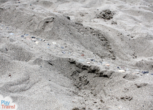 Sand Tracks: Learning with Trains at the Beach @ Play Trains! This activity combines art, science, and sensory play, demonstrating one of the technical pages between chapters in the first book of the Peter's Railway series.  These books are perfect for train-loving children of any age!