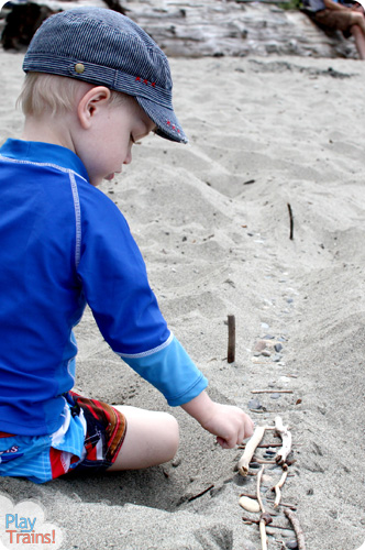 Sand Tracks: Learning with Trains at the Beach @ Play Trains! This activity combines art, science, and sensory play, demonstrating one of the technical pages between chapters in the first book of the Peter's Railway series.  These books are perfect for train-loving children of any age!