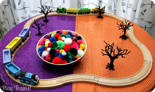 Halloween Carnival Pom Pom Tree Play from Play Trains! Includes both a simple invitation to play and a train play activity.