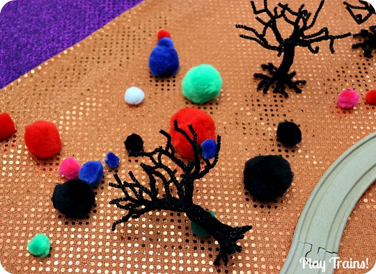 Halloween Carnival Pom Pom Tree Play from Play Trains! Includes both a simple invitation to play and a train play activity.