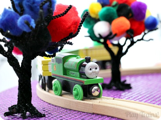 Halloween Carnival Pom Pom Tree Play from Play Trains! Includes both a simple invitation to play and a train play activity.