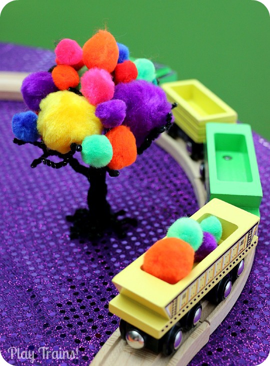 Halloween Carnival Pom Pom Tree Play from Play Trains! Includes both a simple invitation to play and a train play activity.