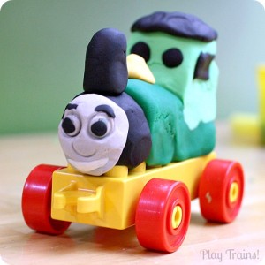 Play Dough Train Set from Play Trains! put together a train-making set for kids with play dough and Duplo bricks.
