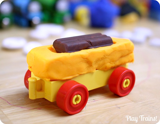 Recycled Play Dough Molds from Play Trains! A great way to reuse toy packaging after Christmas or birthday presents are unwrapped.