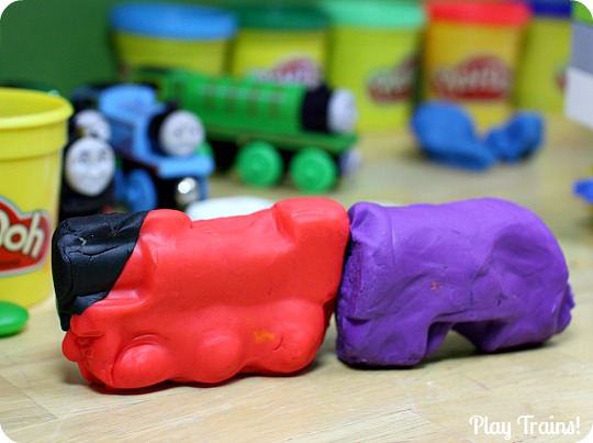 Recycled Play Dough Molds from Play Trains! A great way to reuse toy packaging after Christmas or birthday presents are unwrapped.