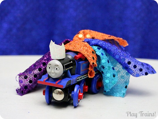 Dress Up Costumes for Toy Trains from Play Trains! A fun way to decorate wooden trains (or other toy trains) without damaging them.