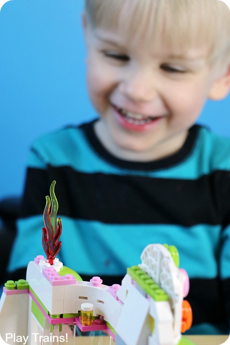 An easy, temporary way to turn any wooden train into a LEGO train. A fun design project for kids from Play Trains!