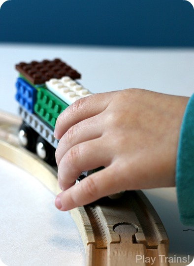 An easy, temporary way to turn any wooden train into a LEGO train. A fun design project for kids from Play Trains!