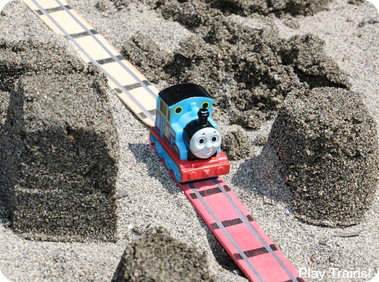 Customize this travel-friendly mini sand play set to match your child's interests!
