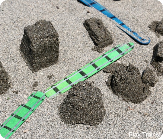 Customize this travel-friendly mini sand play set to match your child's interests!