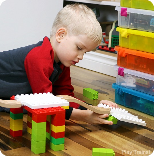 When Dreamup Toys sent us these building toys that connect wooden train tracks to interlocking building blocks to review, I knew they'd be cool, but I had no idea how much they'd supercharge my son's creativity!