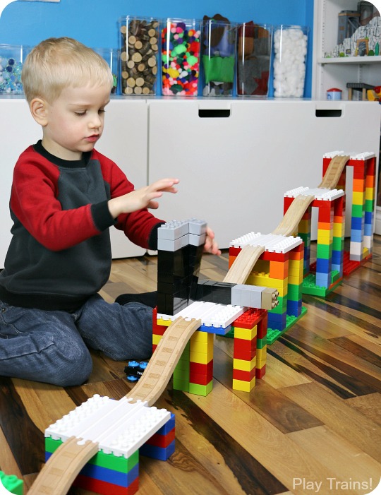 When Dreamup Toys sent us these building toys that connect wooden train tracks to interlocking building blocks to review, I knew they'd be cool, but I had no idea how they'd supercharge my son's creativity!