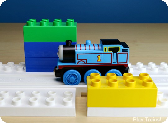 Parents' Guide to Building with Dreamup Toys Wooden Railway Block Platforms -- how to combine your child's wooden train track and DUPLO, LEGO, or other interlocking building blocks!