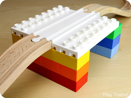 Parents' Guide to Building with Dreamup Toys Wooden Railway Block Platforms -- how to combine your child's wooden train track and DUPLO, LEGO, or other interlocking building blocks!