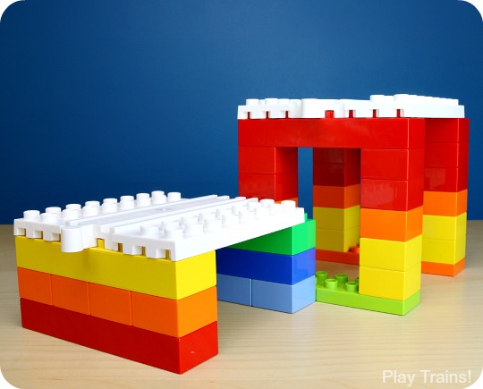 Parents' Guide to Building with Dreamup Toys Wooden Railway Block Platforms -- how to combine your child's wooden train track and DUPLO, LEGO, or other interlocking building blocks!