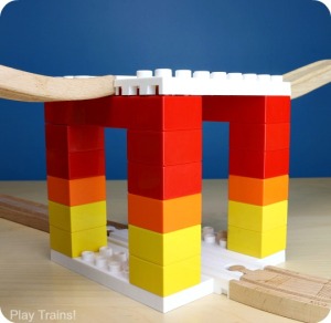 Parents' Guide to Building with Dreamup Toys Wooden Railway Block Platforms -- how to combine your child's wooden train track and DUPLO, LEGO, or other interlocking building blocks!