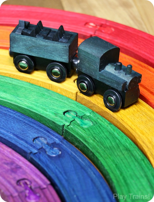 DIY Rainbow Wooden Train: beautiful, vibrant, non-toxic dye brightens up a wooden train set, inspired by the book 150+ Screen-Free Activities for Kids! Perfect for playing out the classic board book, Freight Train by Donald Crews.