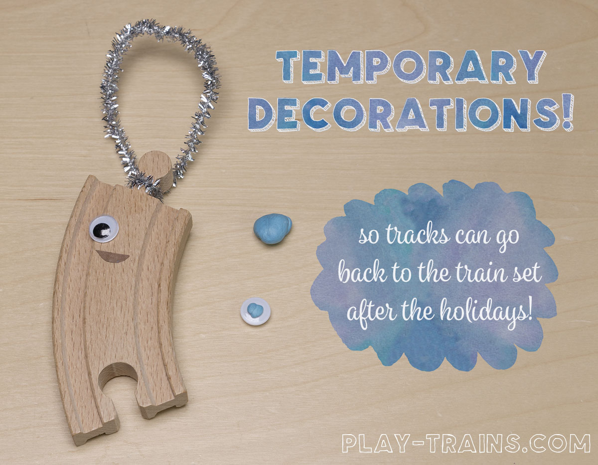 DIY wooden train track Christmas ornaments inspired by OLD TRACKS, NEW TRICKS by Jessica Petersen. The decorations are temporary so the tracks can go back to the train set after the holidays!